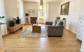 Apartmány u komína